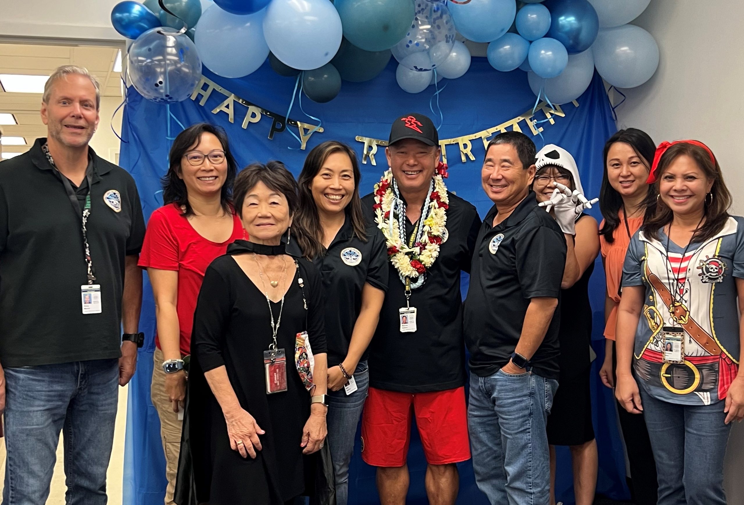 Chairperson Marcus R. Oshiro pictured with Board members and staff